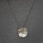 handmade round silver pendant with crystal